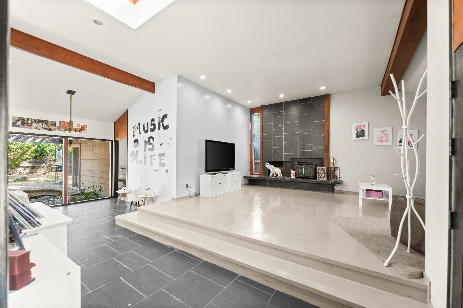 738 Webster Street Colusa, CA 95932 - Photo 10 of 56 a large white kitchen with a large window and couch