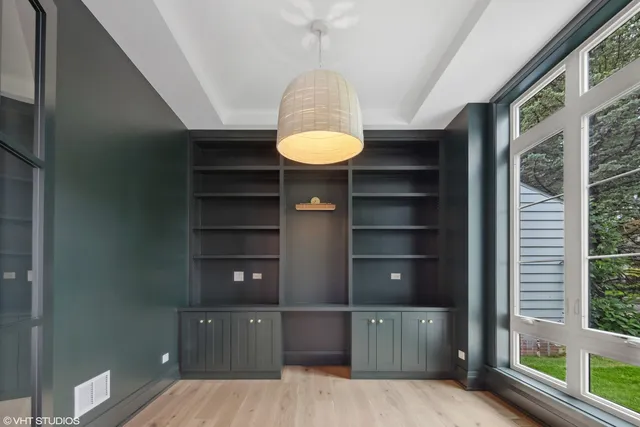 a bathroom with a toilet a sink and a mirror