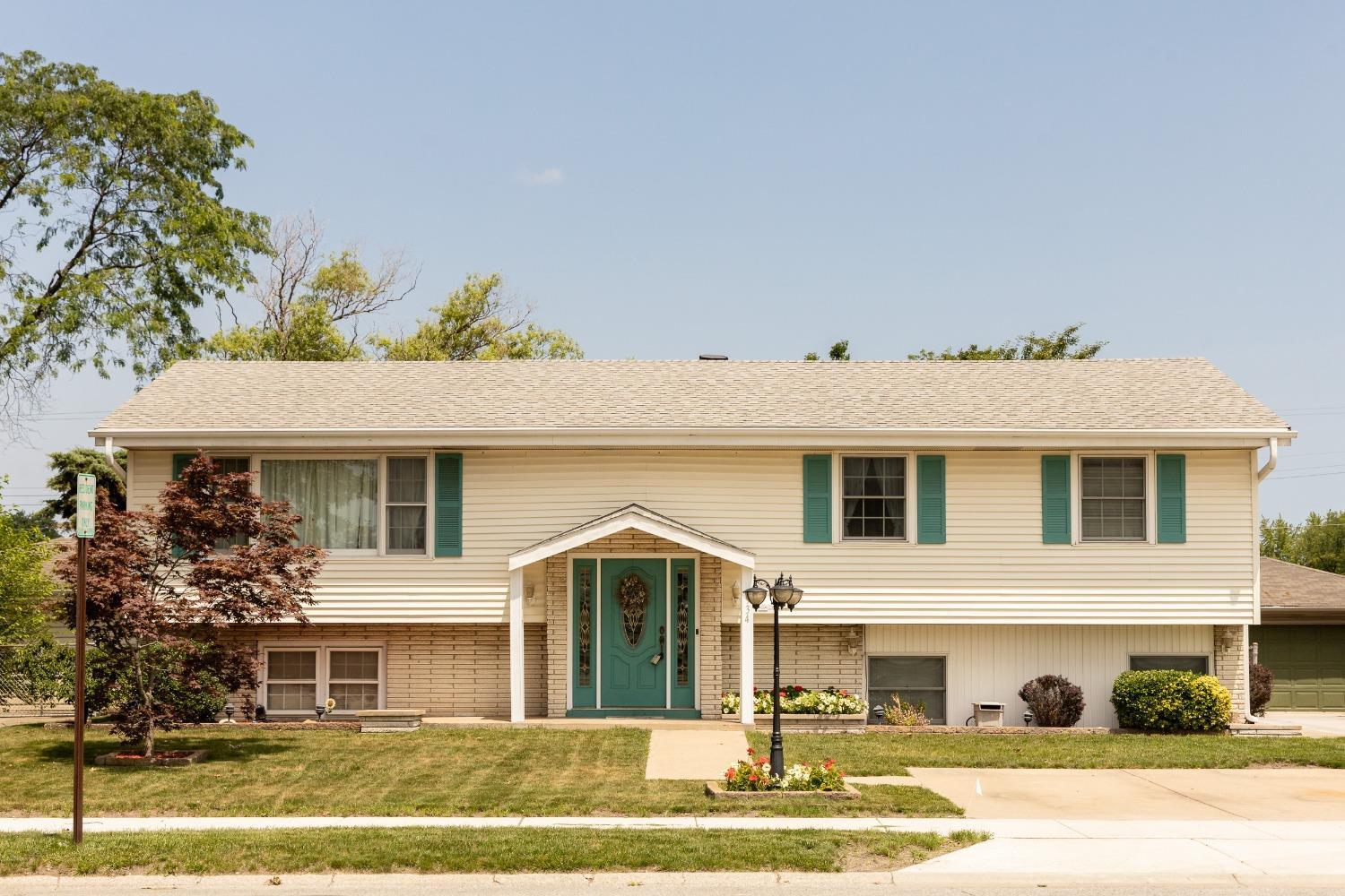 934 West Pine Street Griffith, IN 46319 - Photo 1 of 12 a front view of a house with a yard