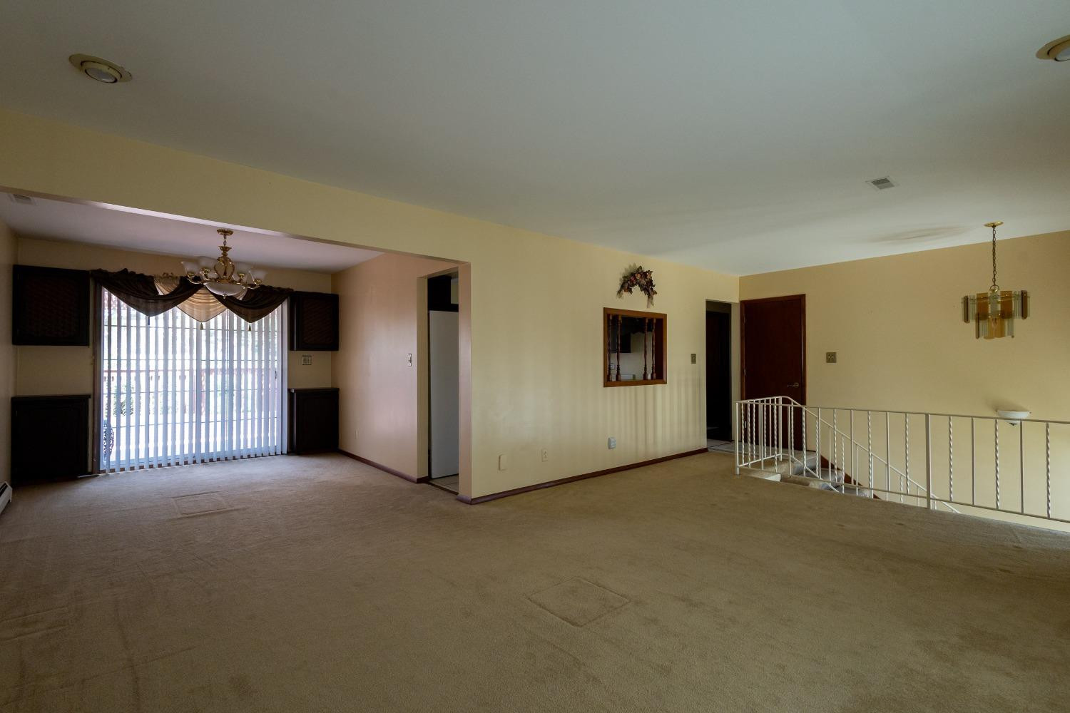 934 West Pine Street Griffith, IN 46319 - Photo 3 of 12 a view of empty room with ceiling fan