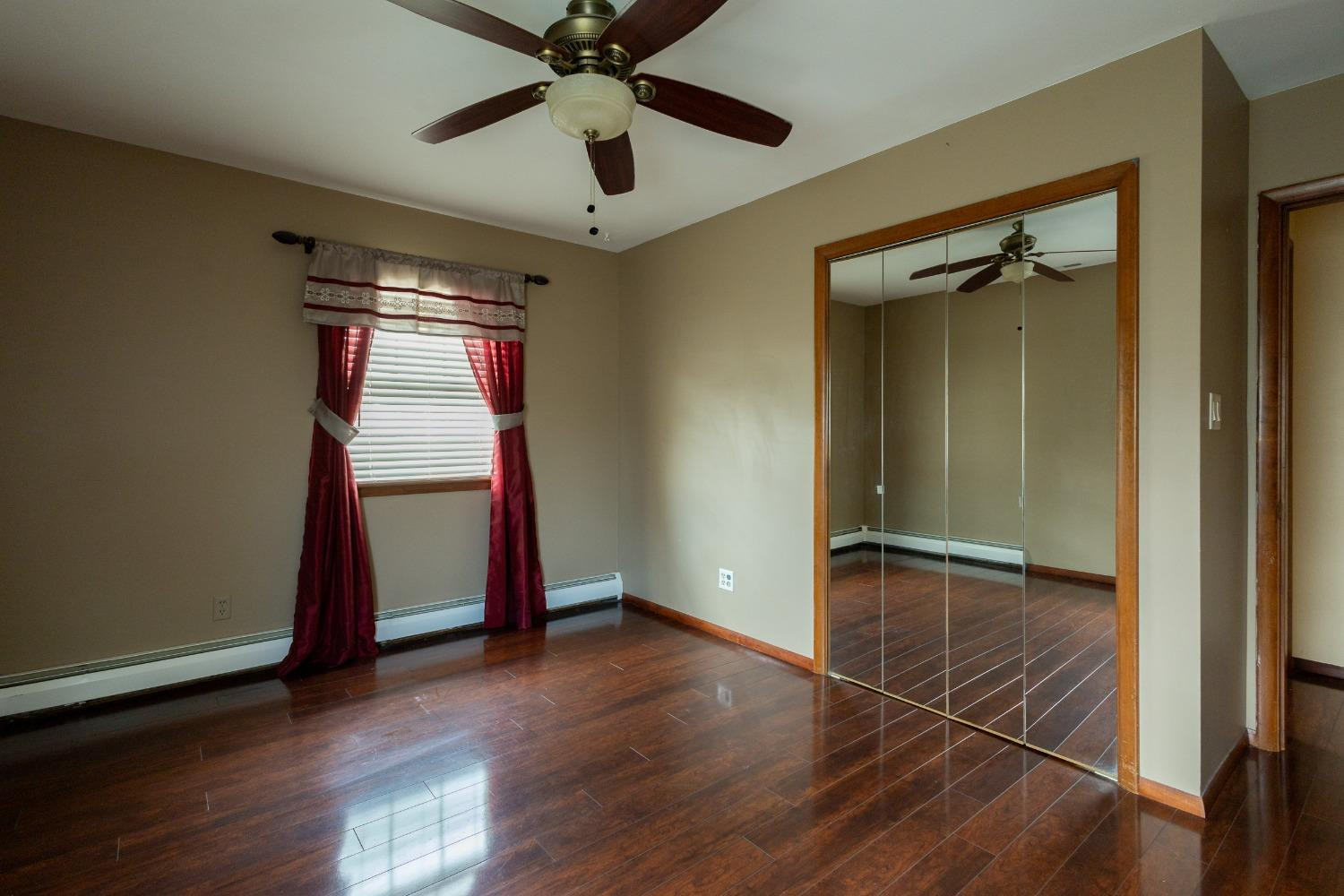 934 West Pine Street Griffith, IN 46319 - Photo 6 of 12 wooden floor in an empty room