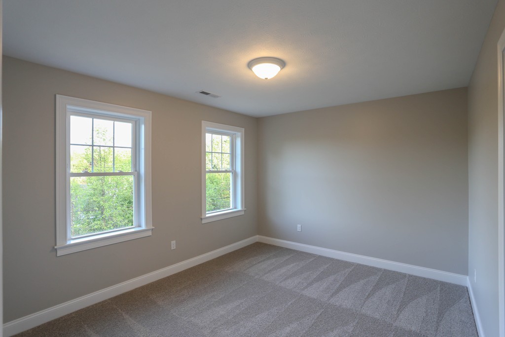 14 Spring Street Hopkinton, MA 01748 - Photo 10 of 16 an empty room with a window