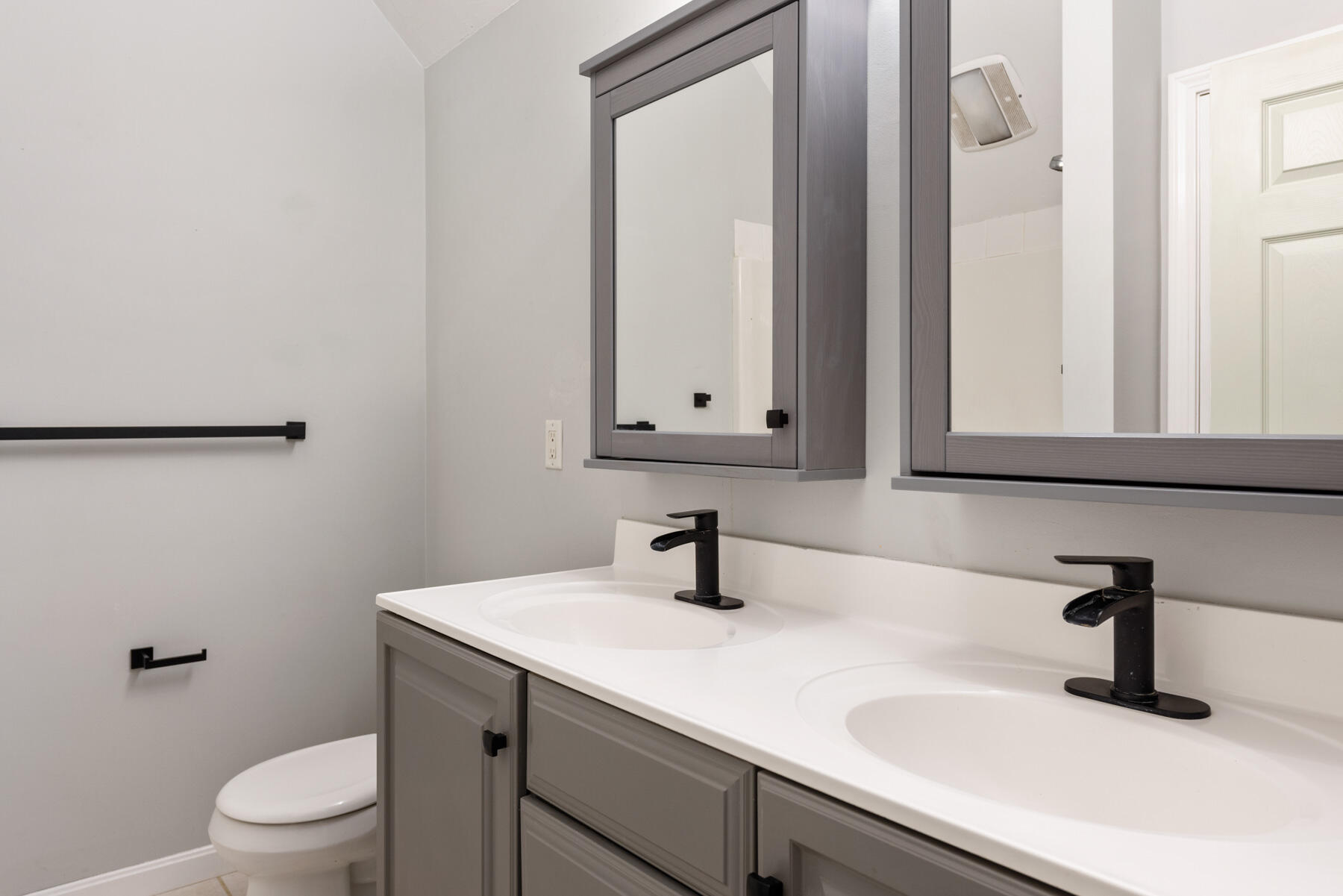 25 Gilbert Lane Harwich Port, MA 02646 - Photo 22 of 25 a bathroom with a sink a toilet and mirror