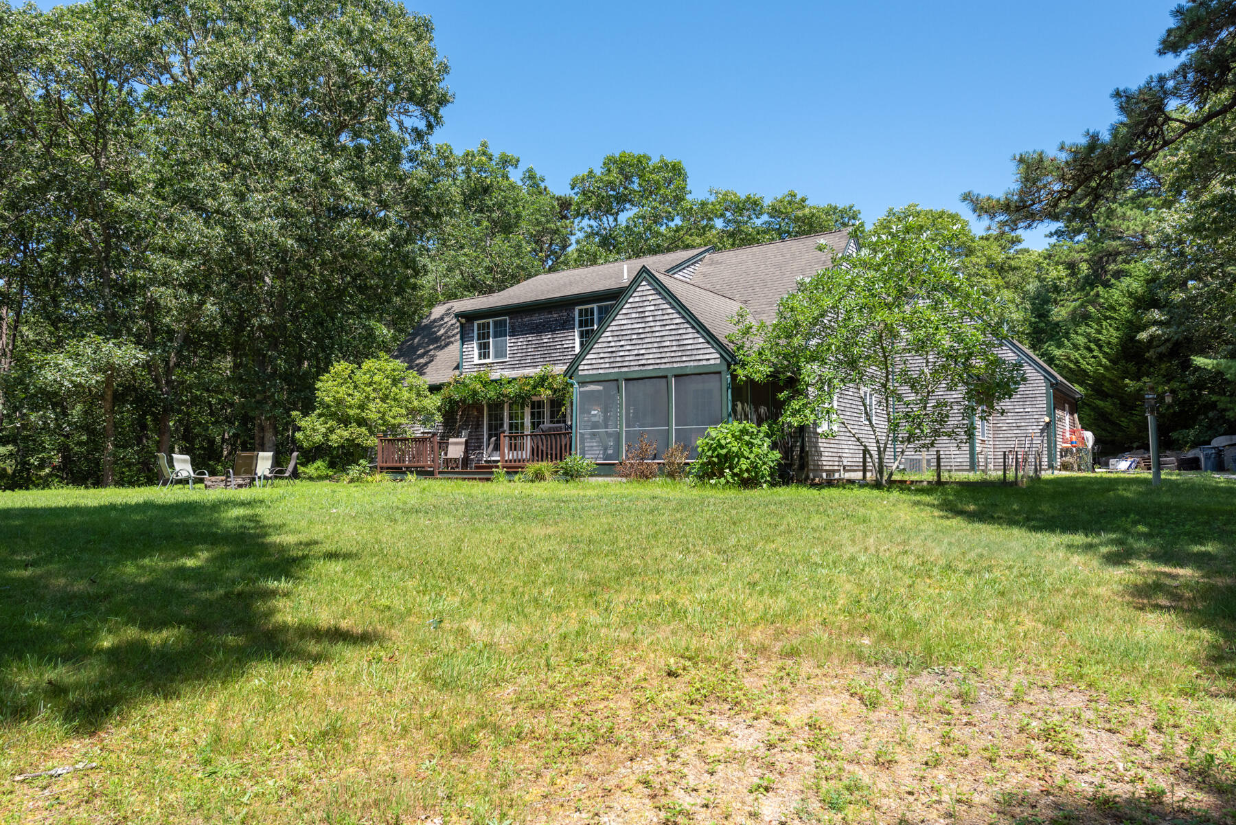 25 Gilbert Lane Harwich Port, MA 02646 - Photo 4 of 25 a front view of a house with garden