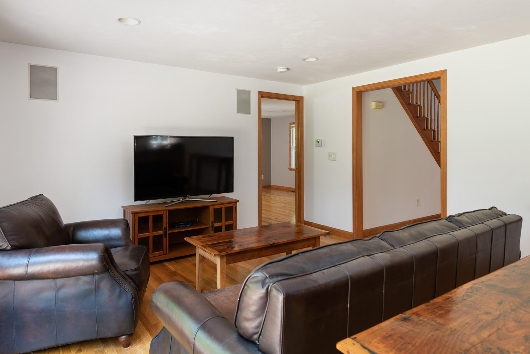 25 Gilbert Lane Harwich Port, MA 02646 - Photo 10 of 25 a living room with furniture and a flat screen tv