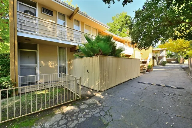 a house with trees in the background