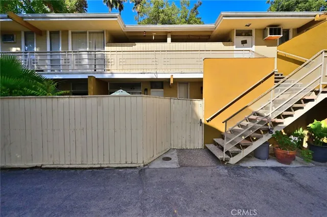 a view of a car park in front of a building