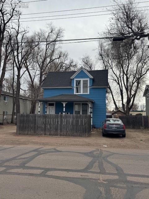 311 Brookside Street Colorado Springs, CO 80905 - Photo 19 of 20 a view of a house with a large tree
