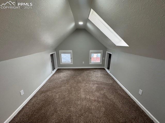 311 Brookside Street Colorado Springs, CO 80905 - Photo 9 of 20 an empty room with windows