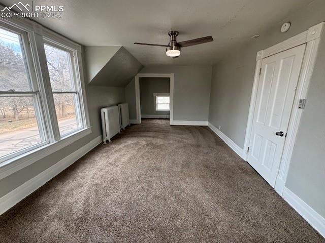311 Brookside Street Colorado Springs, CO 80905 - Photo 10 of 20 a view of a livingroom with a ceiling fan and window