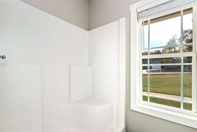 a view of a bathroom with a window