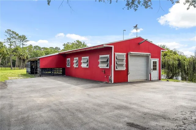 a bathroom with a shower curtain and a sink