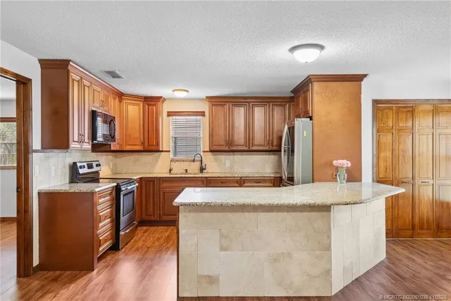 $1,295,000 | 4800 Southwest Woodham Street, Palm City, FL 34990