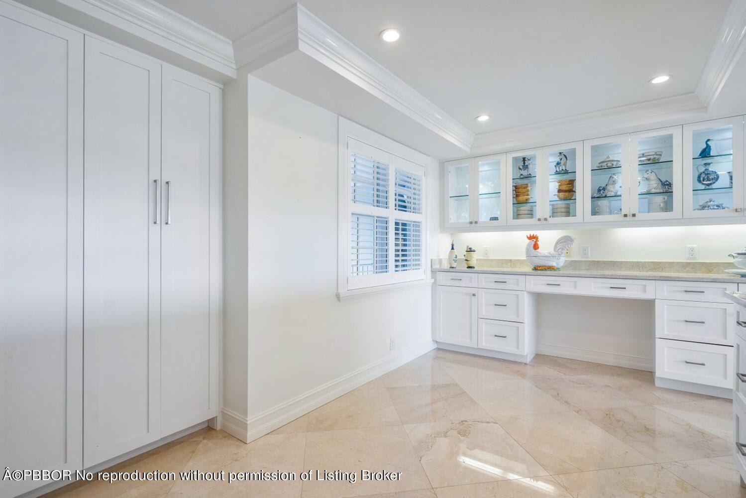 2195 Ibis Isle Road, Unit 7 Palm Beach, FL 33480 - Photo 12 of 34 a kitchen with granite countertop a sink and cabinets