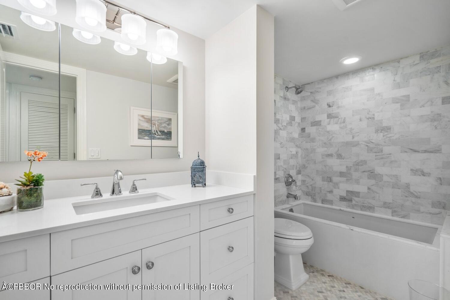 2195 Ibis Isle Road, Unit 7 Palm Beach, FL 33480 - Photo 23 of 34 a bathroom with a sink a toilet and shower