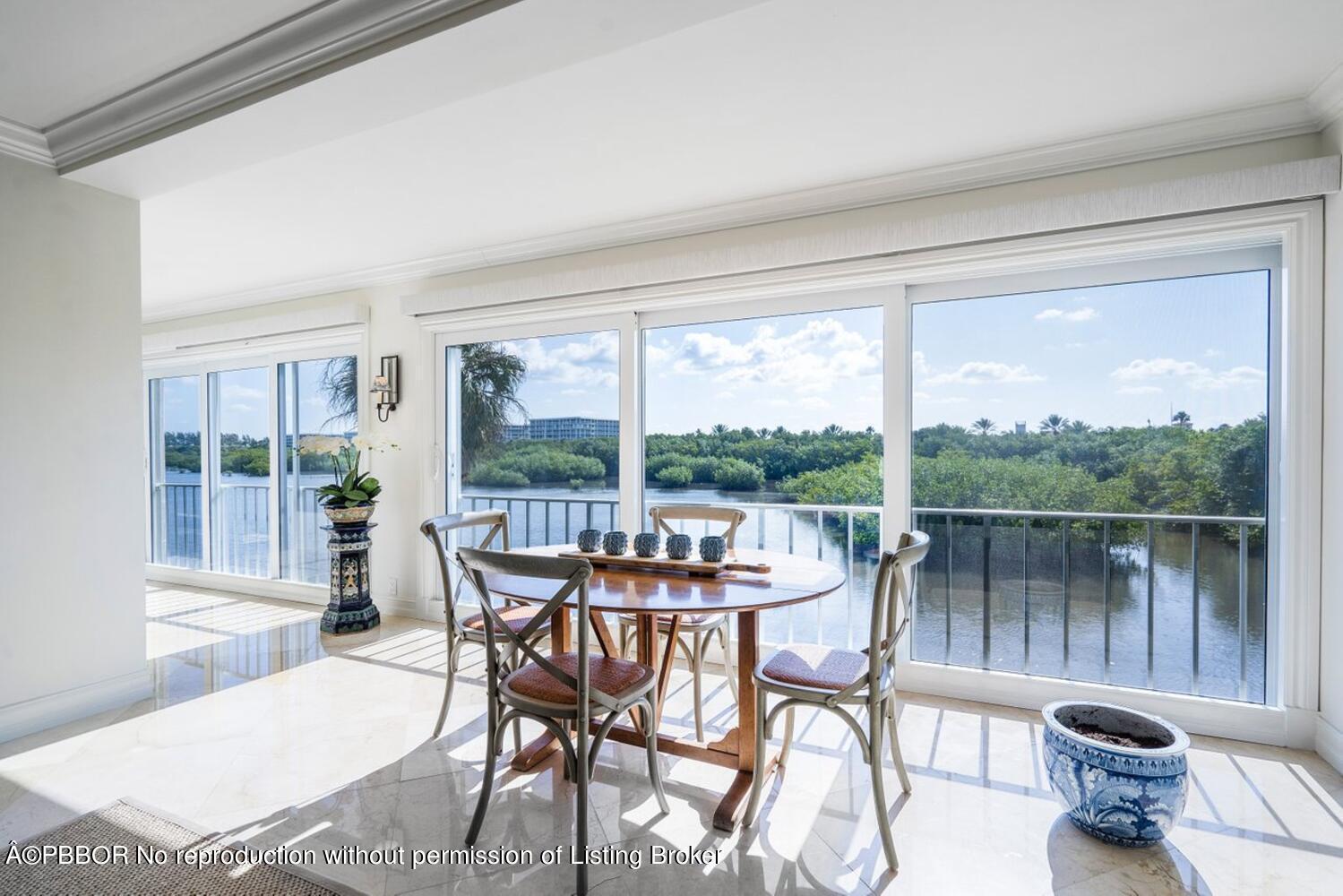 2195 Ibis Isle Road, Unit 7 Palm Beach, FL 33480 - Photo 3 of 34 a dining room with furniture window and outside view