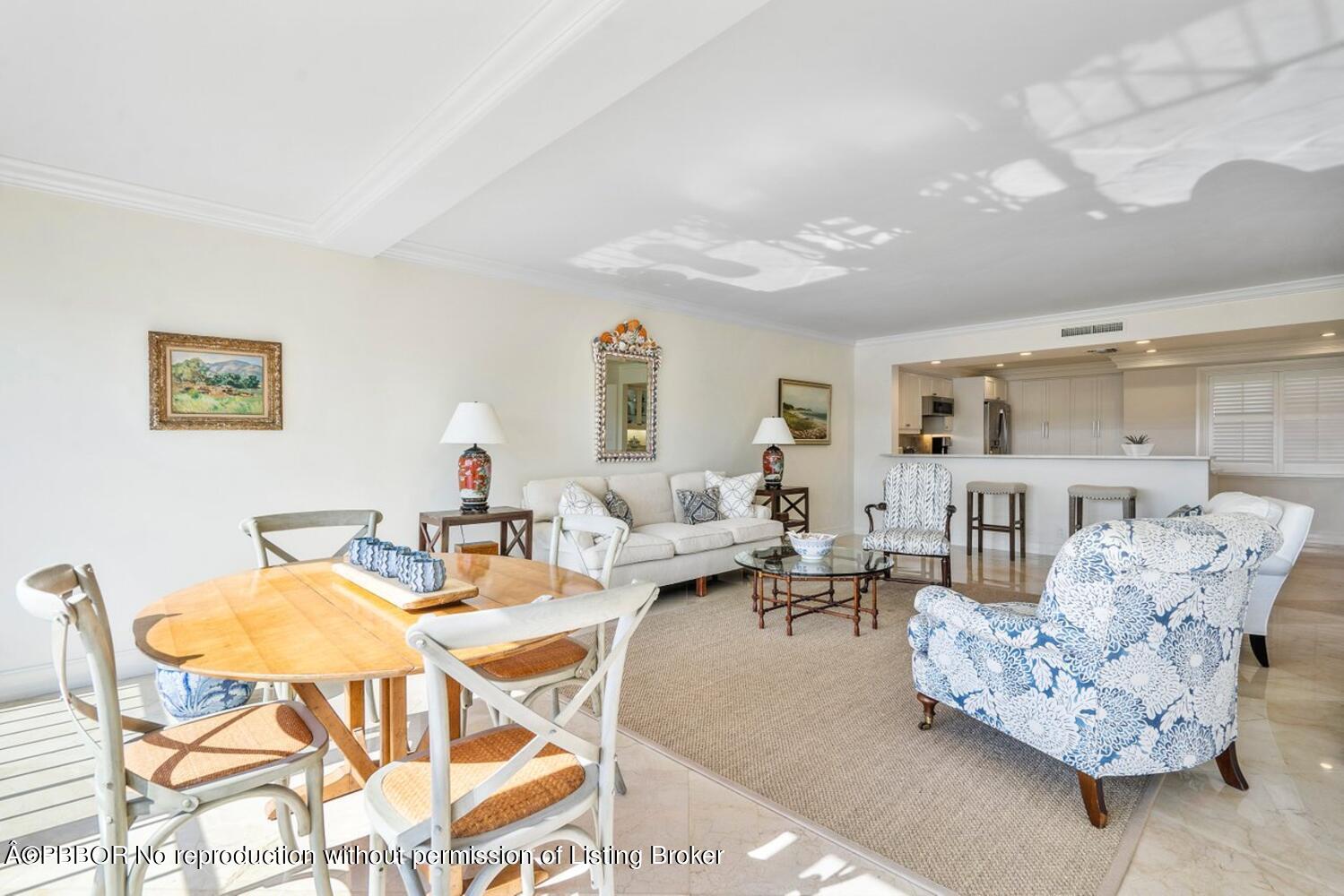 2195 Ibis Isle Road, Unit 7 Palm Beach, FL 33480 - Photo 7 of 34 a living room with furniture and a large window