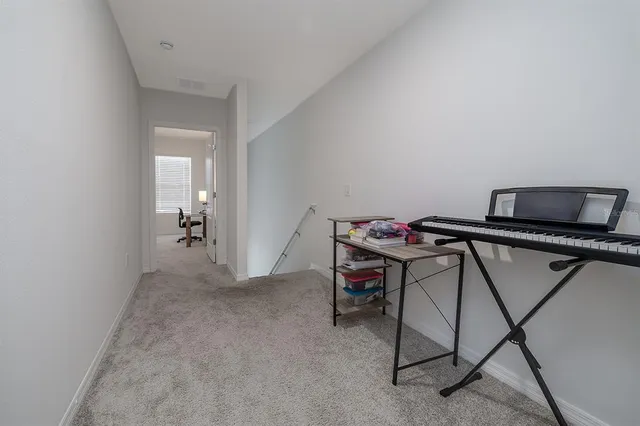 a bedroom with a bed and a closet