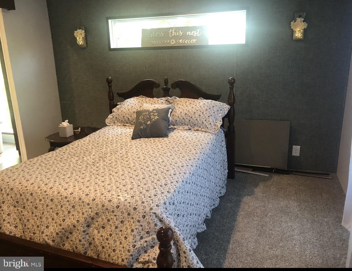 10134 Piney Mountain Road Southwest Frostburg, MD 21532 - Photo 11 of 15 a bedroom with a bed and a window