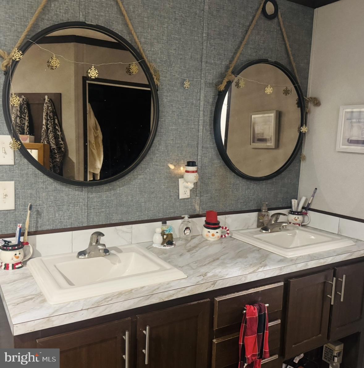 10134 Piney Mountain Road Southwest Frostburg, MD 21532 - Photo 15 of 15 a bathroom with a sink and a mirror