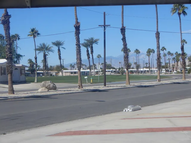 front view of a building with a view of trees