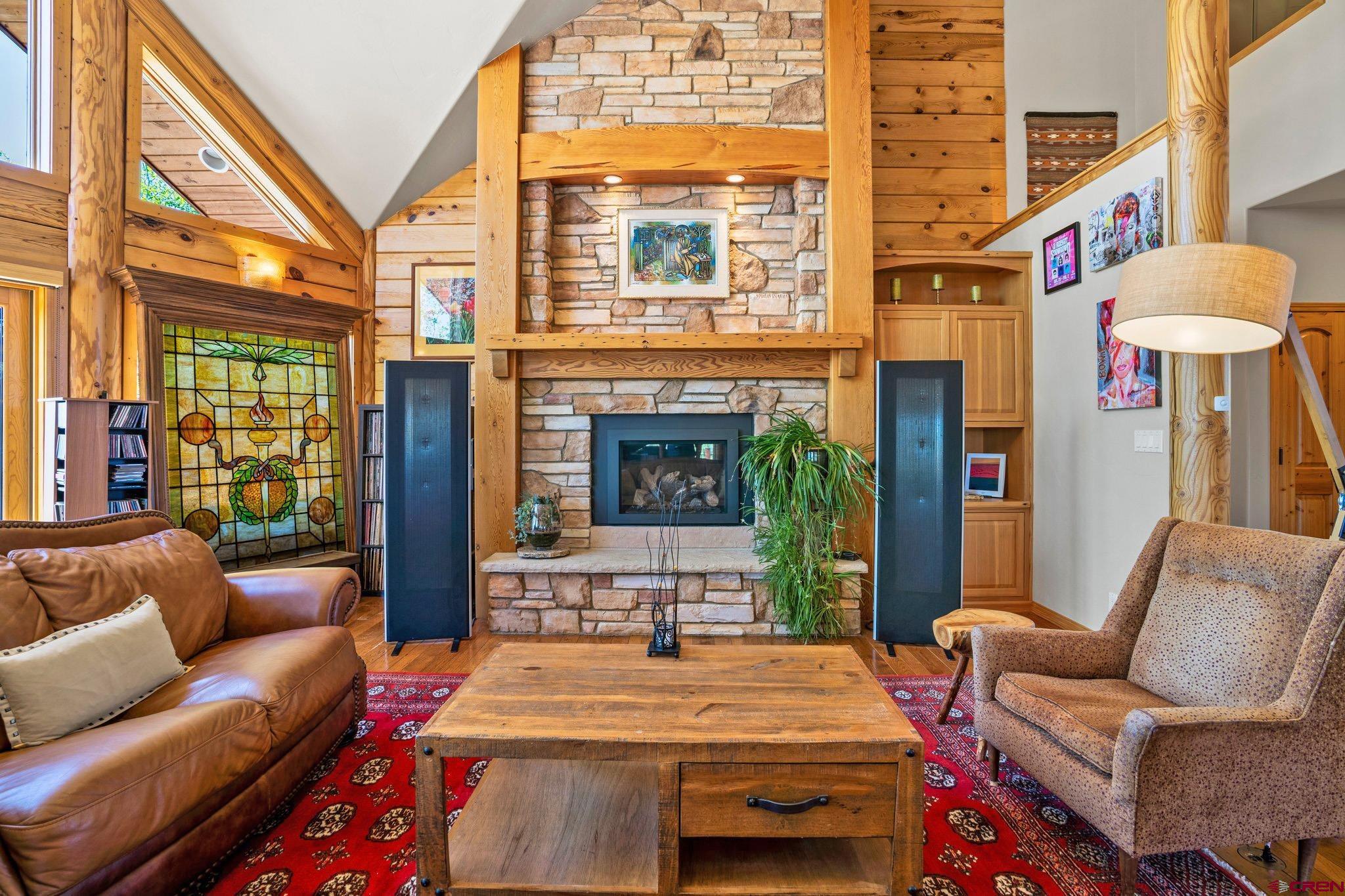 50 West Durango Ridge Road Durango, CO 81301 - Photo 12 of 45 a outdoor living space with patio furniture and a fireplace