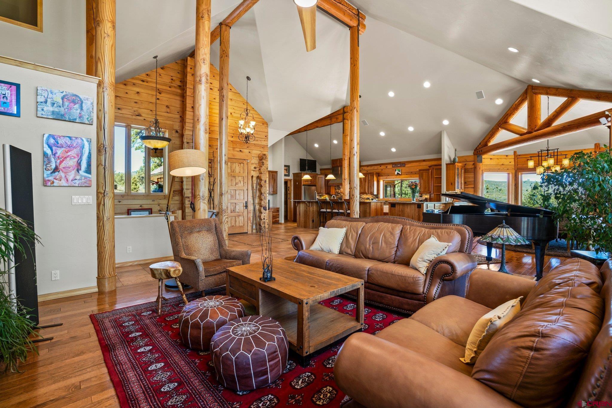 50 West Durango Ridge Road Durango, CO 81301 - Photo 20 of 45 a living room with furniture and a floor to ceiling window