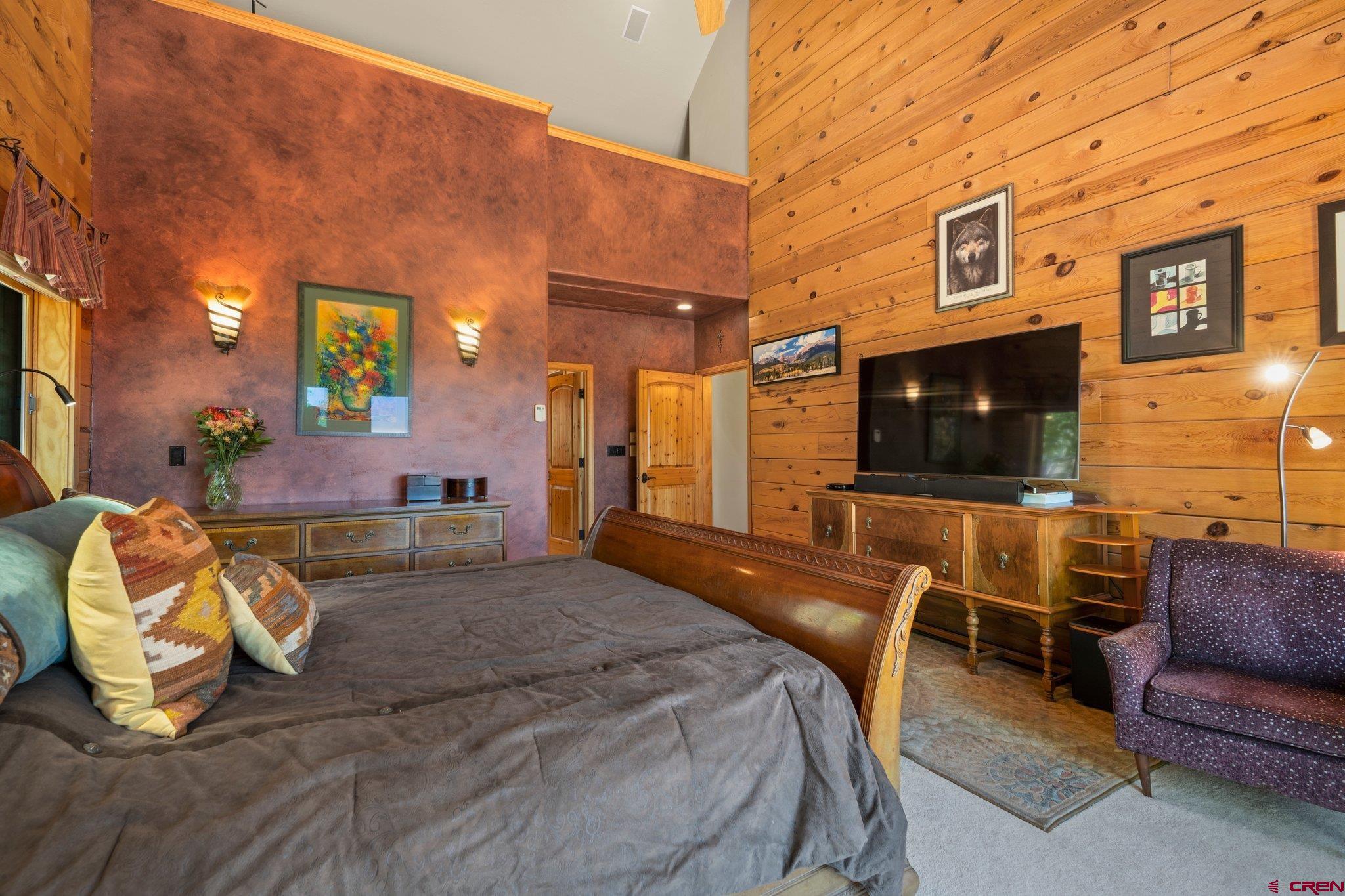 50 West Durango Ridge Road Durango, CO 81301 - Photo 23 of 45 a living room with furniture and a flat screen tv