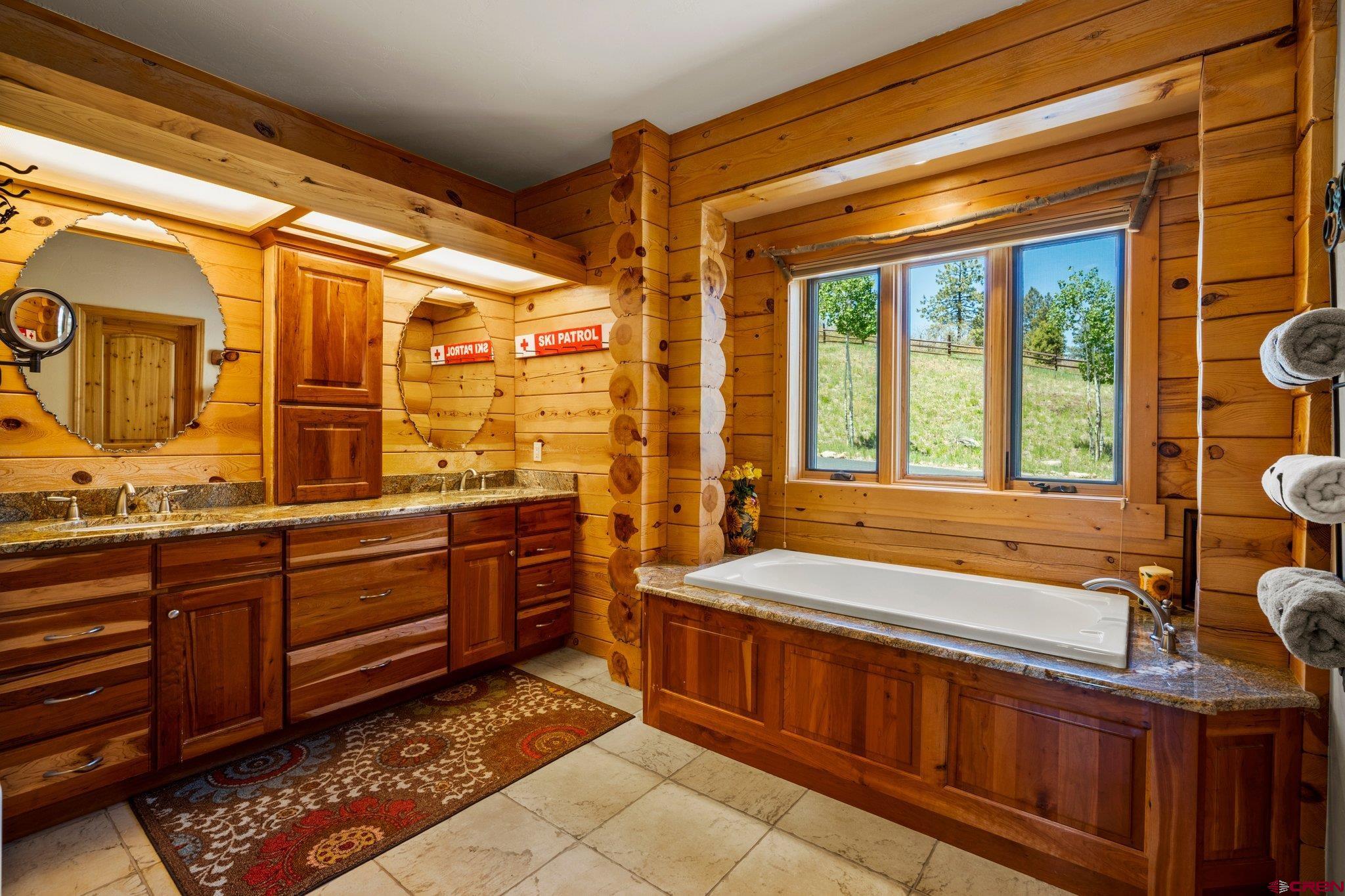 50 West Durango Ridge Road Durango, CO 81301 - Photo 24 of 45 a bathroom with a sink and a bathtub