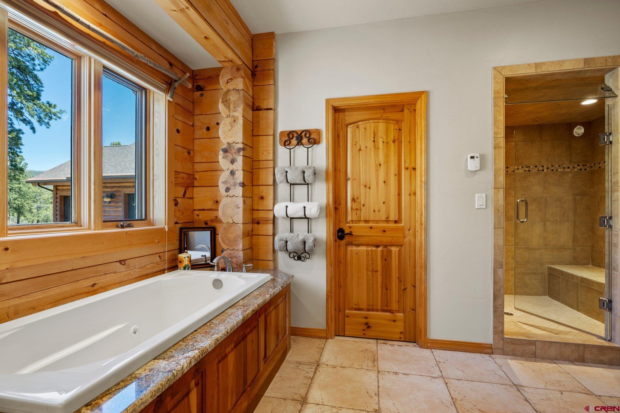 50 West Durango Ridge Road Durango, CO 81301 - Photo 25 of 45 a bathroom with a sink and a mirror