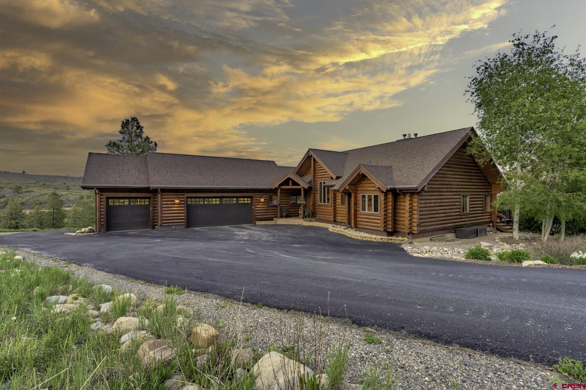 50 West Durango Ridge Road Durango, CO 81301 - Photo 3 of 45 a view of a house with wooden fence