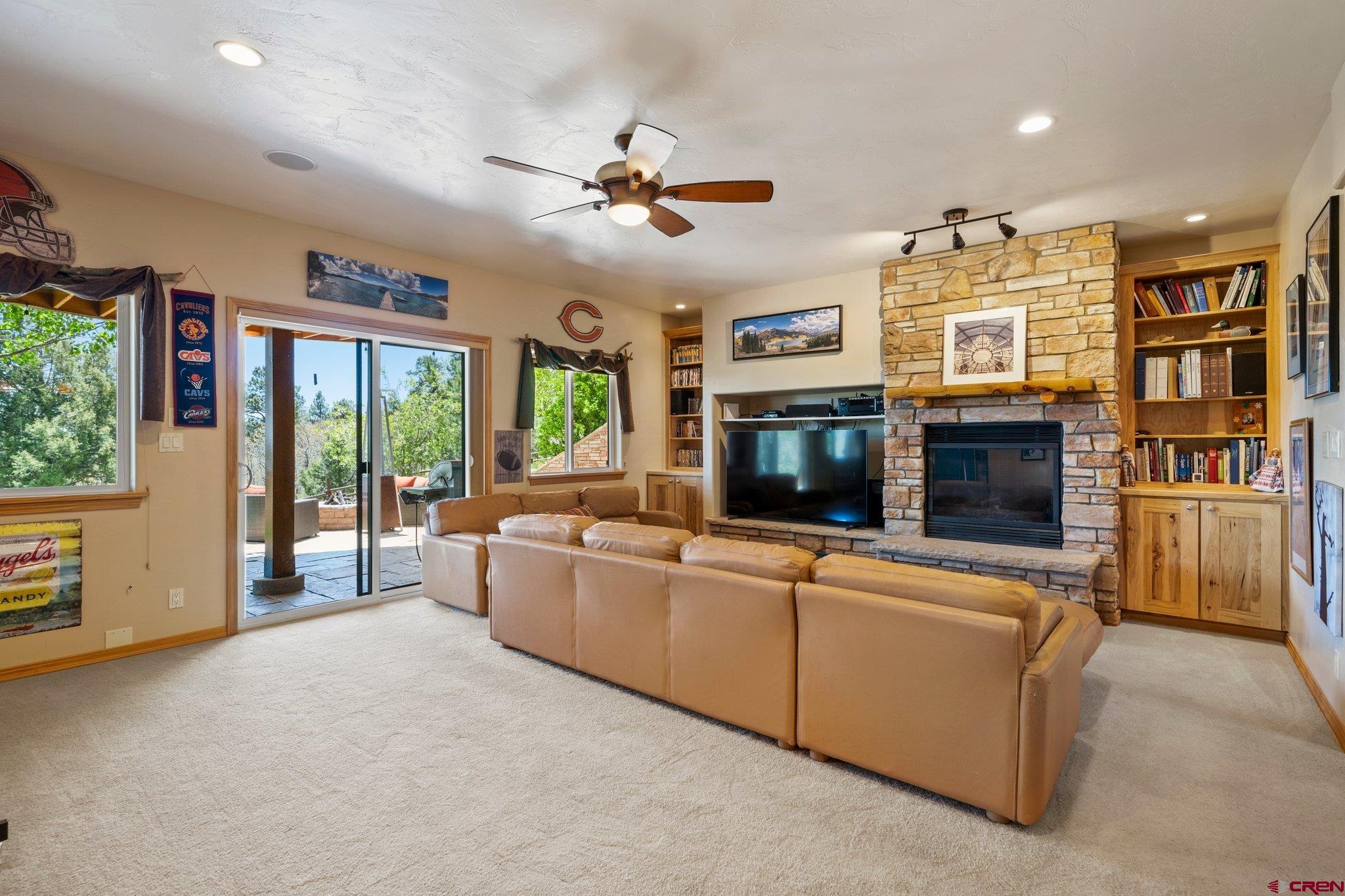 50 West Durango Ridge Road Durango, CO 81301 - Photo 32 of 45 a living room with furniture and a flat screen tv