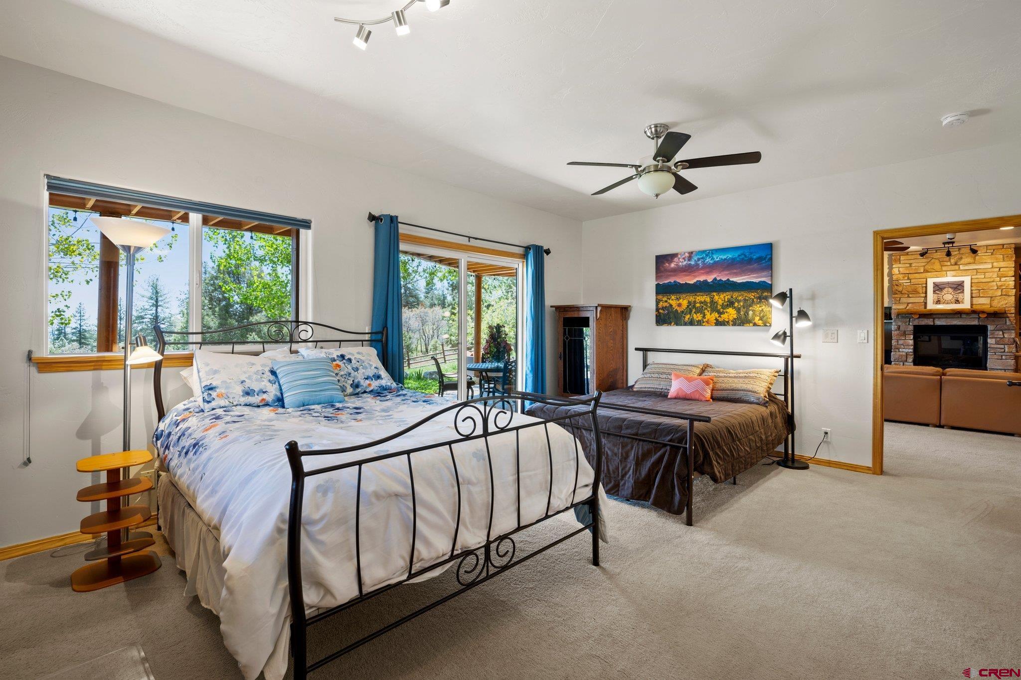 50 West Durango Ridge Road Durango, CO 81301 - Photo 41 of 45 a bed room with furniture and a flat screen tv