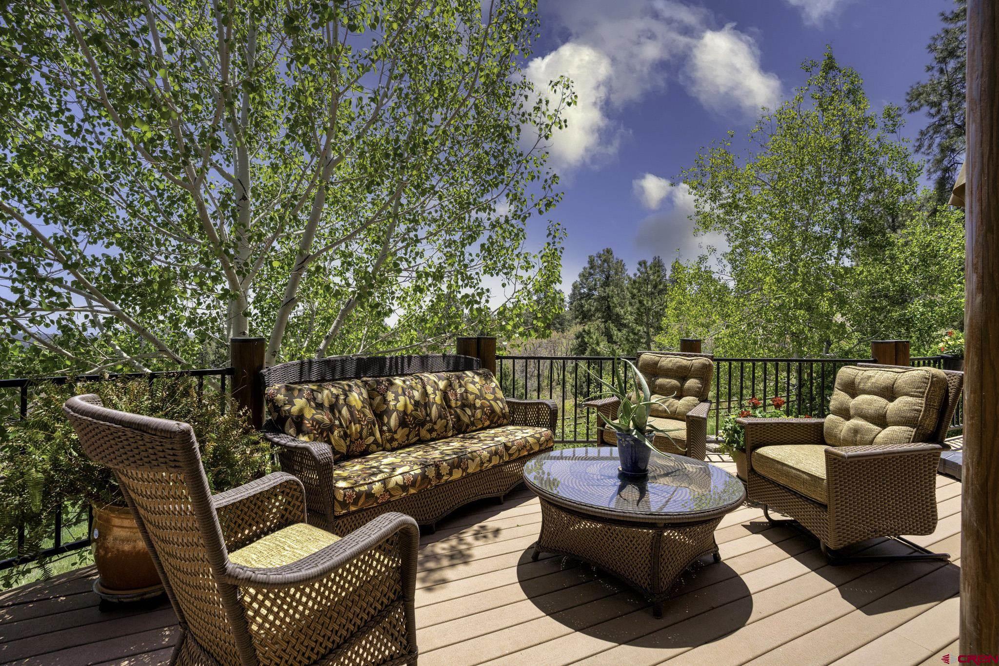 50 West Durango Ridge Road Durango, CO 81301 - Photo 6 of 45 a balcony with furniture and wooden floor