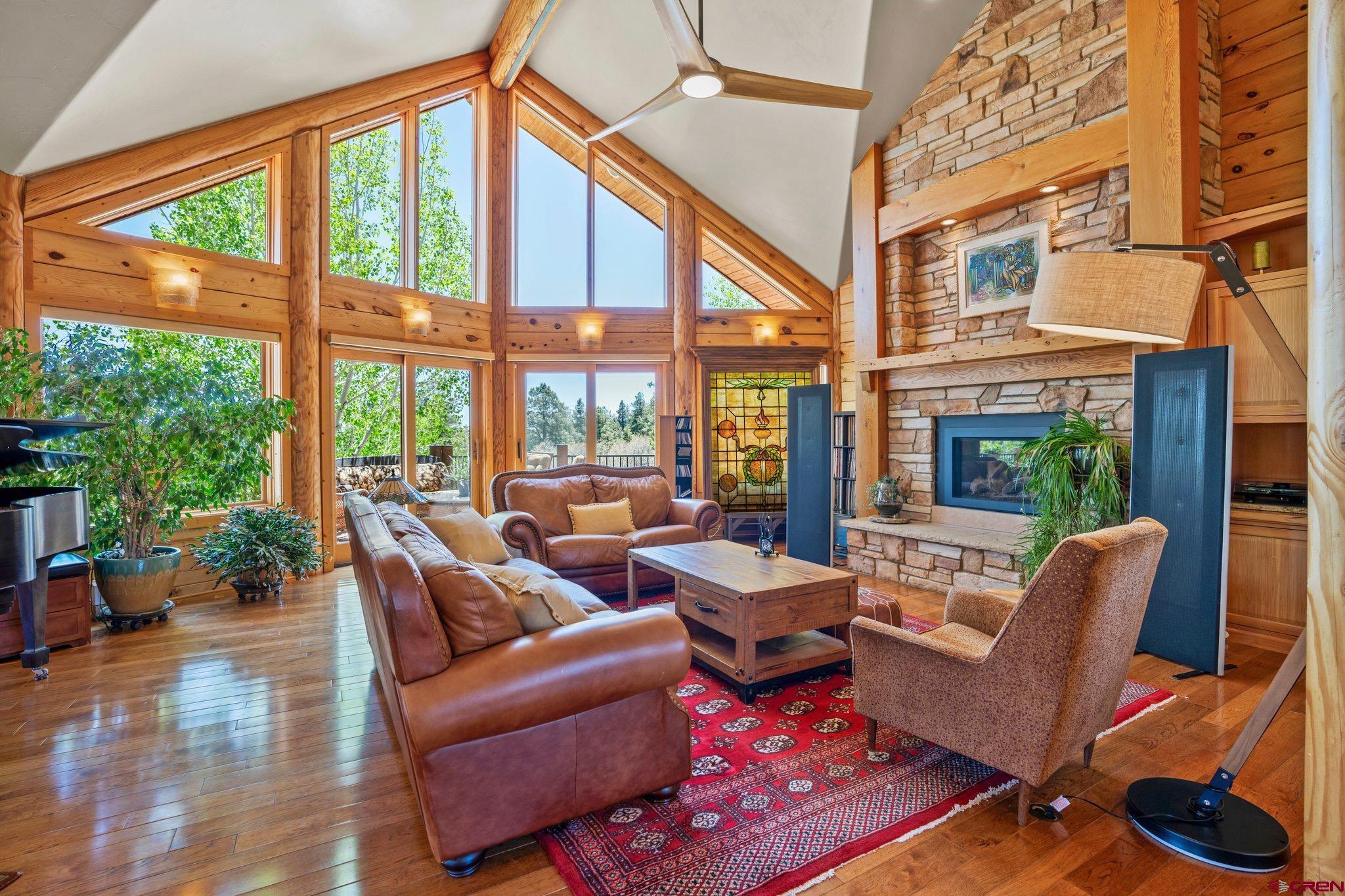 50 West Durango Ridge Road Durango, CO 81301 - Photo 7 of 45 a living room with patio furniture and a large window