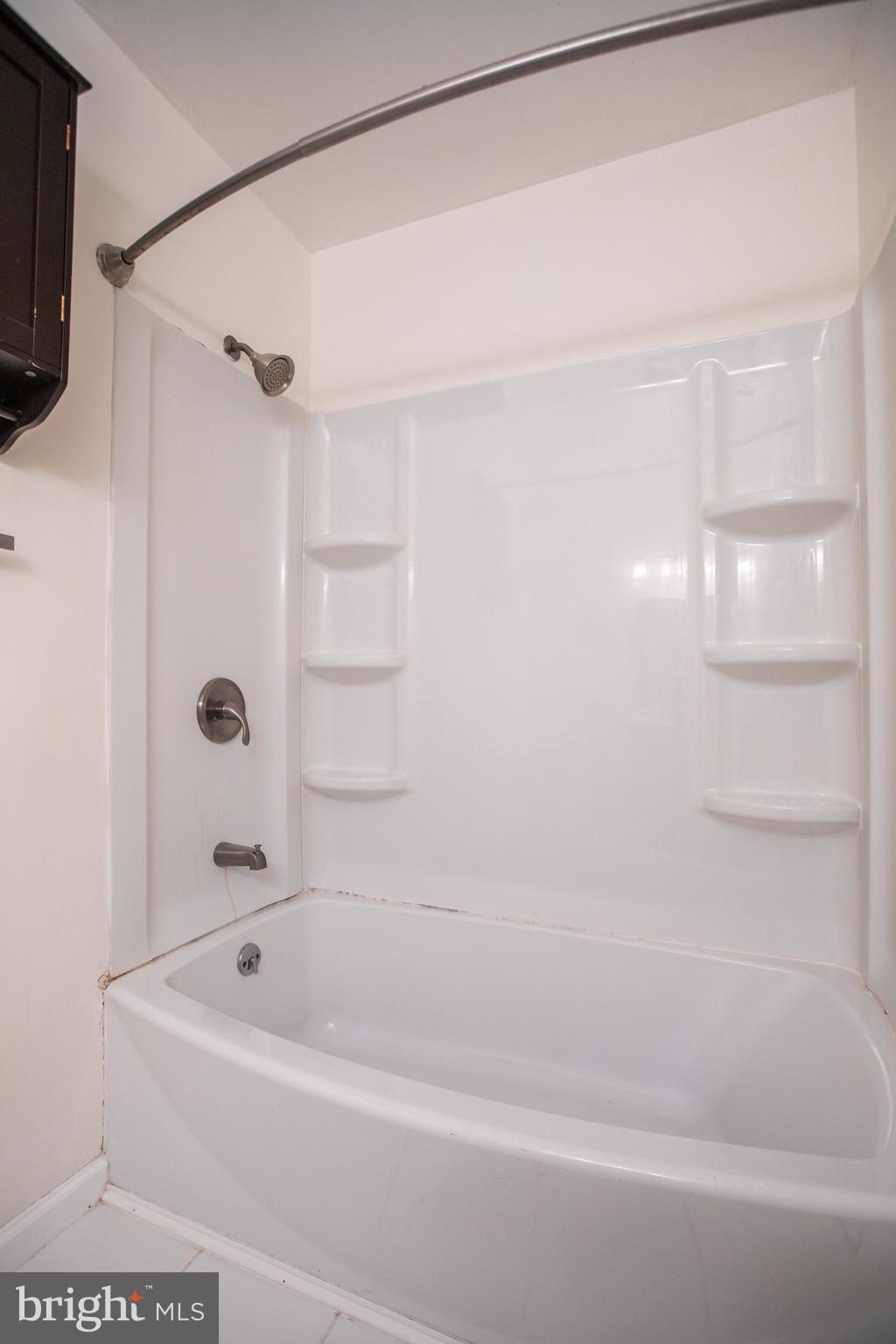43 Fairmount Avenue Sicklerville, NJ 08081 - Photo 16 of 24 a bathroom with a bathtub