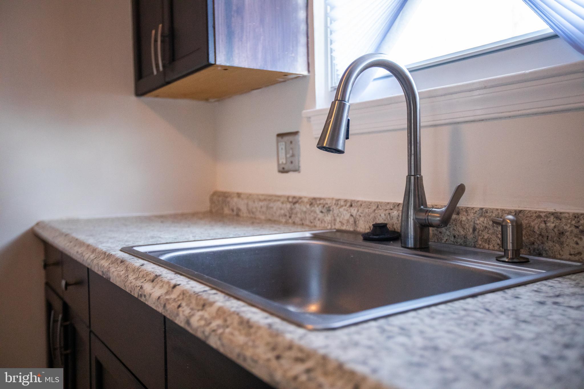 43 Fairmount Avenue Sicklerville, NJ 08081 - Photo 8 of 24 a close view of sink and tap