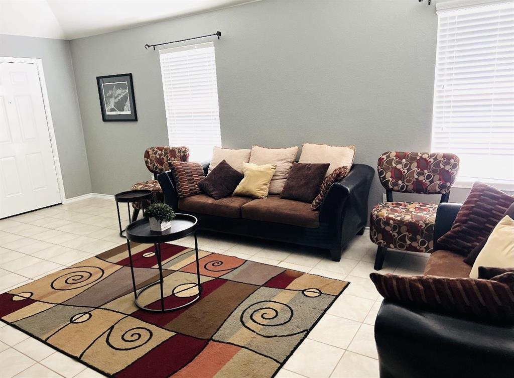 2302 San Marcos Drive Forney, TX 75126 - Photo 6 of 27 a living room with furniture and a window