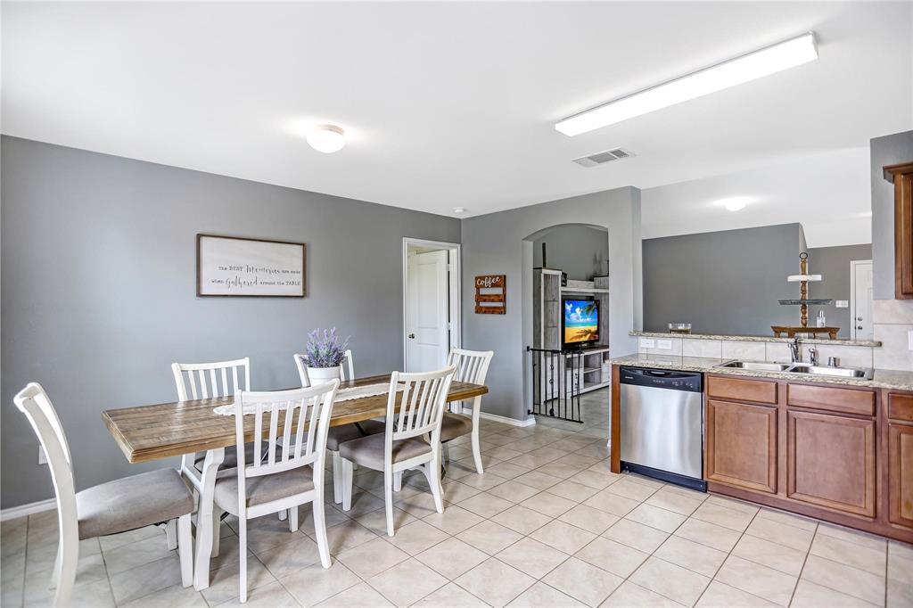 2302 San Marcos Drive Forney, TX 75126 - Photo 9 of 27 a view of a dining room kitchen and a sink