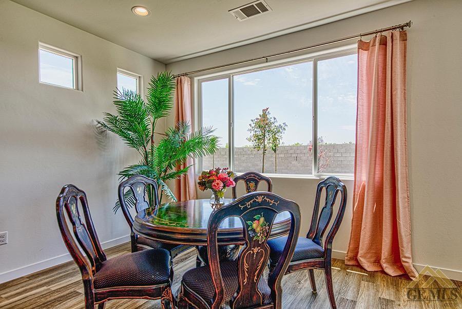 Undisclosed Address Bakersfield, CA 93311 - Photo 4 of 12 a view of a dining room with furniture window and outside view