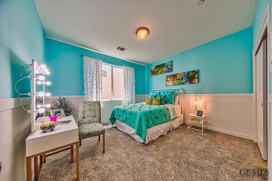 Undisclosed Address Bakersfield, CA 93311 - Photo 7 of 12 a bedroom with furniture and a bed