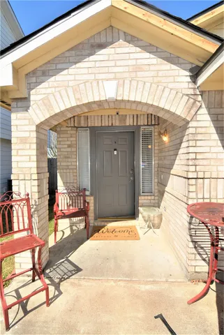 a bedroom with a bed and a table