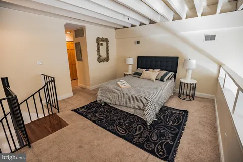 a entryway of a house with wooden floor