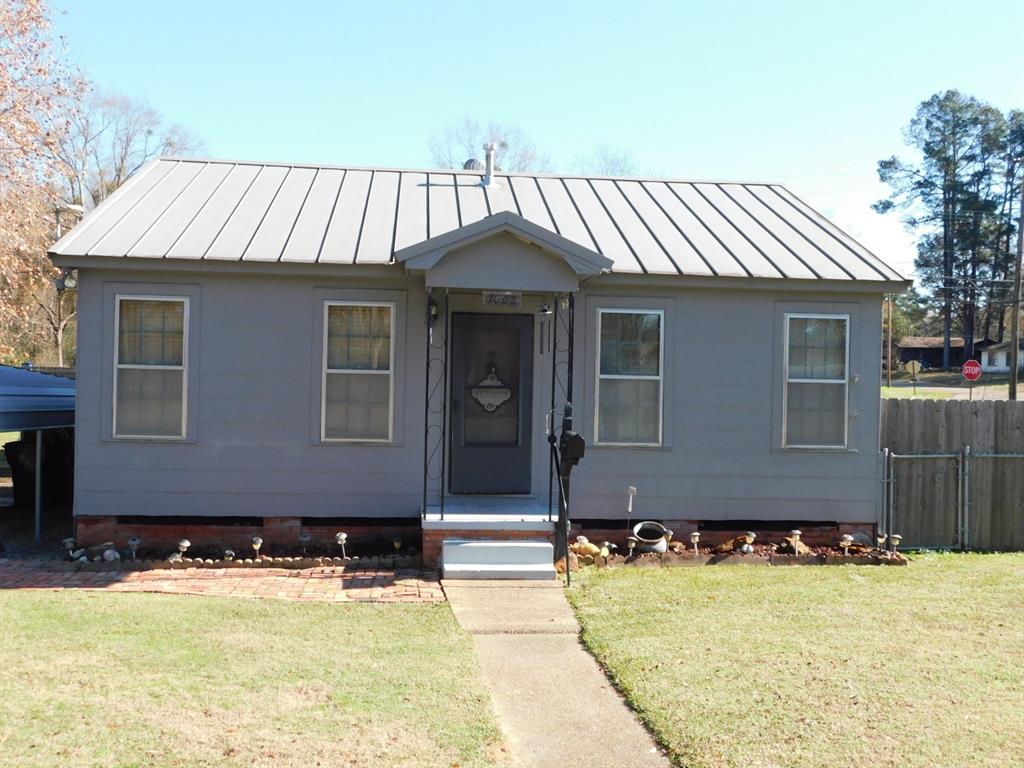 1003 2nd Street Southeast Springhill, LA 71075 - Photo 1 of 1 View of front of home featuring a front lawn