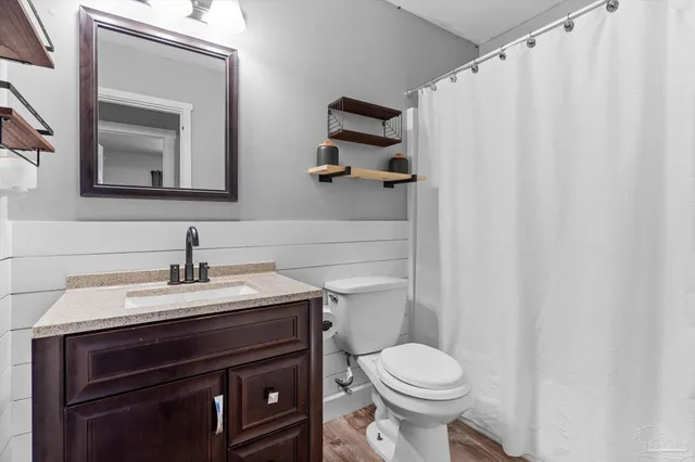 a bed room with a bed and a window