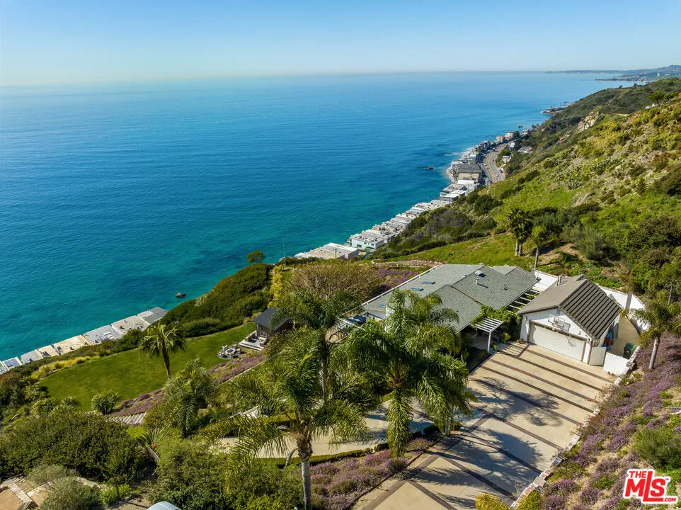 20542 Seaboard Road Malibu, CA 90265 - Photo 1 of 1 a view of an ocean from a balcony