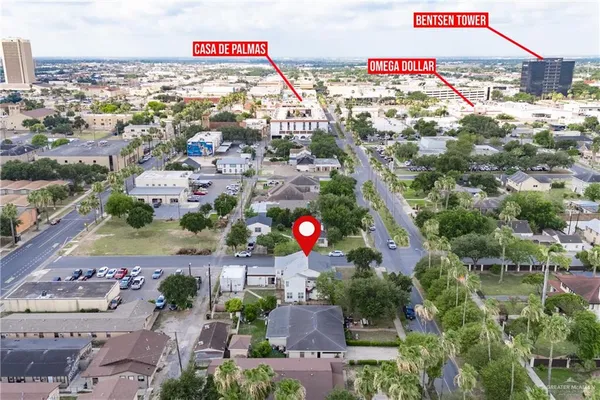 an aerial view of residential houses with outdoor space