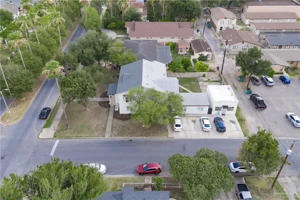 an aerial view of a house with a garden