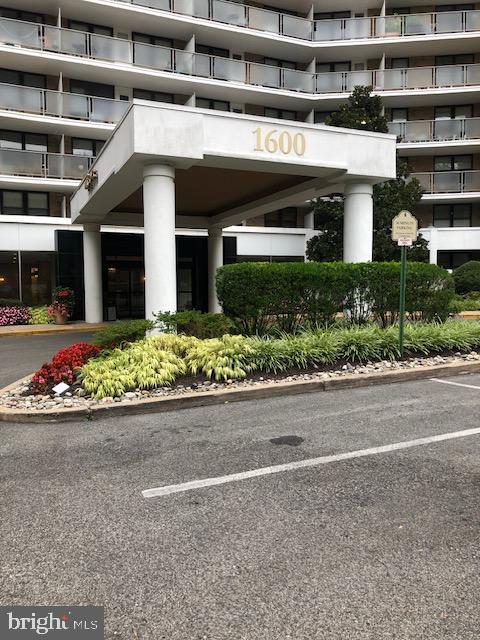 1600 Hagys Ford Road, Unit 3E Penn Valley, PA 19072 - Photo 3 of 18 a front view of a house with a yard