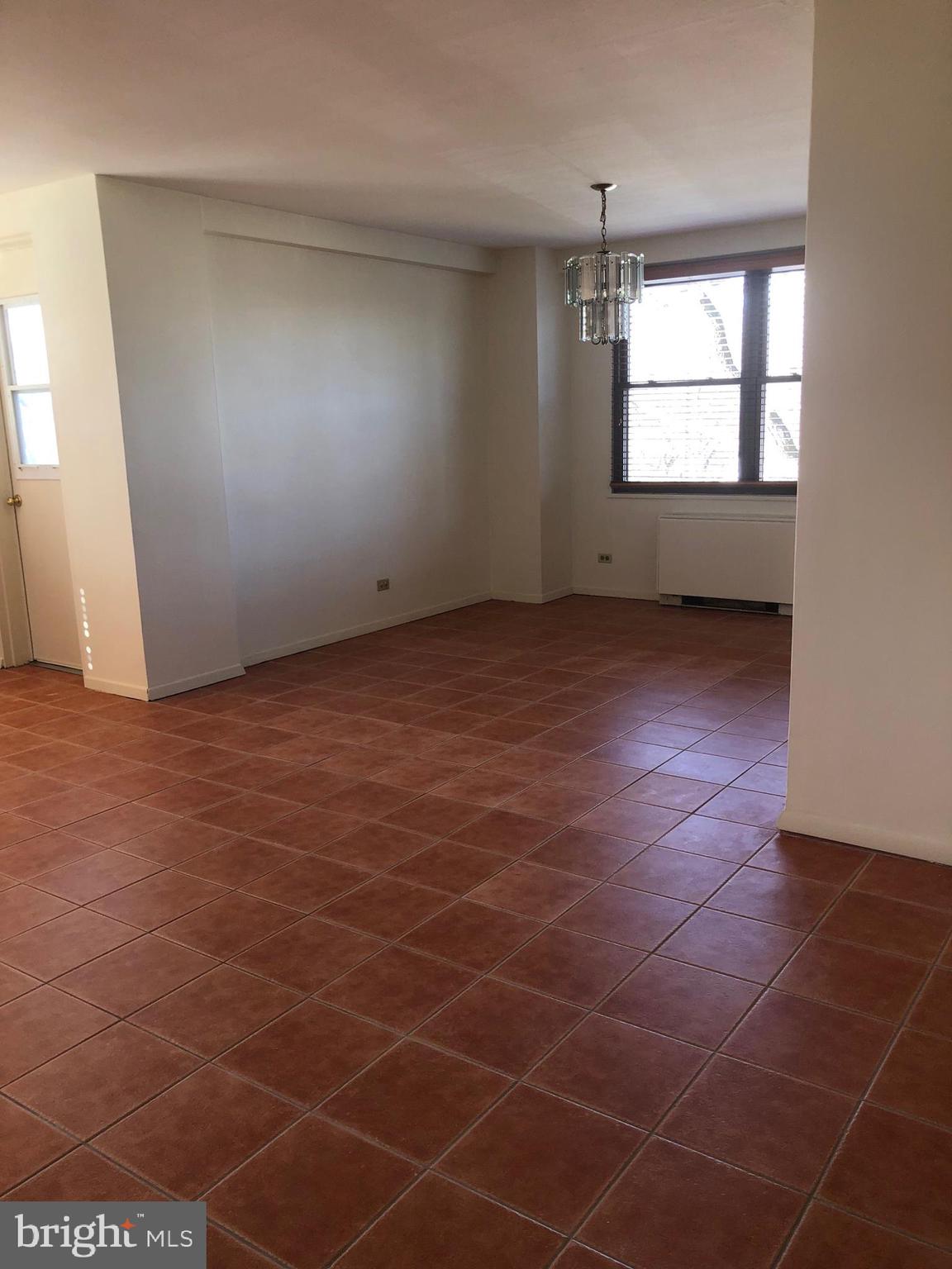 1600 Hagys Ford Road, Unit 3E Penn Valley, PA 19072 - Photo 7 of 18 an empty room with windows and entrance